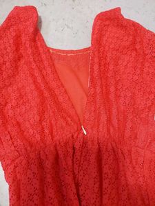 Elegant Coral Lace Gown with Embellished Neckline