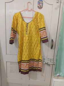 Beautiful yellow kurta with knot at back