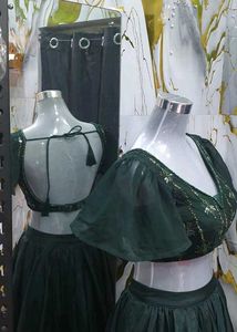Elegant Green Lehenga Choli with Embellished Blous