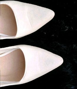 White Pointed Slingback Heels.