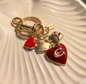 Coach Heart Charm Keychain