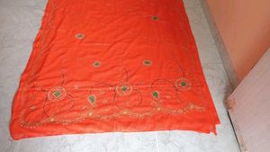 royal rajputi old time .Orange Embroidered Saree