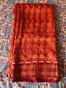 Vibrant Orange and Red Ikat Saree