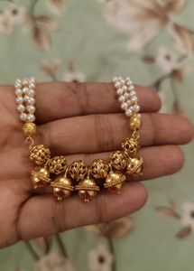 haram with white pearls