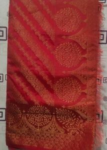 Elegant Red Saree with Golden Motifs