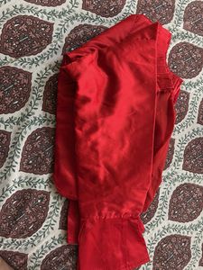 Vibrant Red Ethnic blouse and sky color chaniya