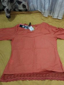 Elegant Coral Kurta with Lace Detailing