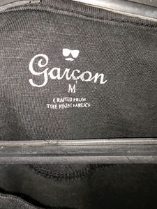 MEN'S BLACK T SHIRT WITH GARCON PRINT AND FUNKY DESIGN AT BOTTOM
