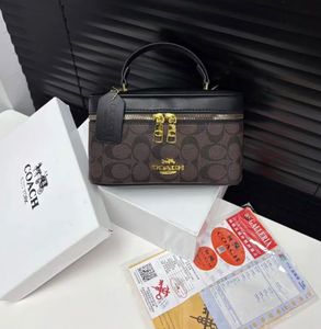 Coach Signature Vanity Bag