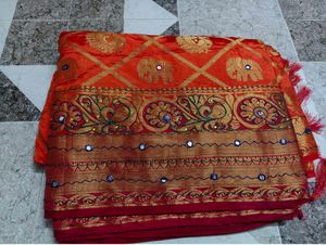 Vibrant Orange Silk Saree with Elephant Motifs