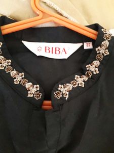 Elegant Black Embroidered Tunic Top
