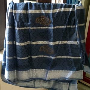 Elegant Blue Saree with Intricate Patterns