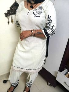 Elegant Cream Kurta Set with Black Embroidery