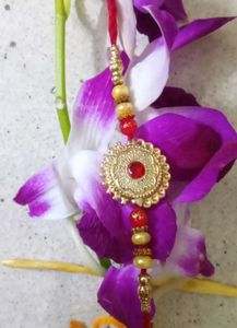 7 Assorted Rakhi Bracelets with Ornate Designs