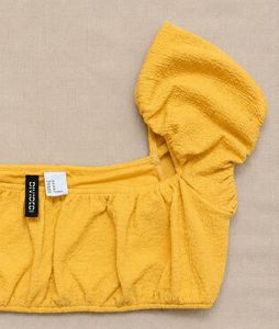 Sunflower yellow textured puff-sleeve crop top