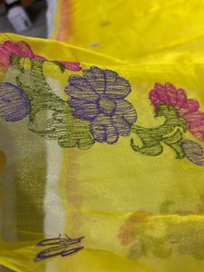 Vibrant Yellow Saree with Floral Motifs