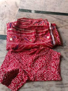Vibrant Red Bandhani Saree with Intricate Designs