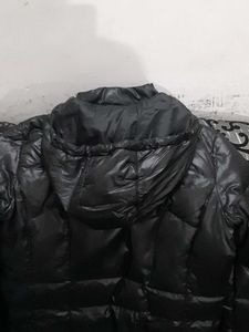 Black Puffer Jacket with Red Accents