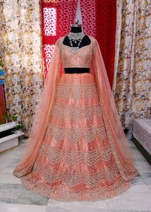 Stunning Peach Embroidered Lehenga Choli