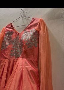 Elegant Coral Gown with Capelet