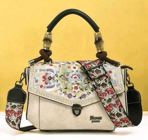 Embroidered Handbag with Floral Strap