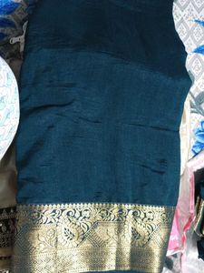 Elegant Teal Saree with Gold Border