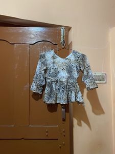 Chic Animal Print Peplum Top
