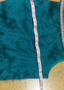 Teal blue blouse with embellishments