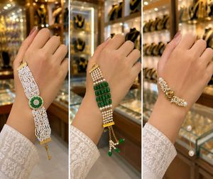 Elegant Pearl &amp; Emerald Bracelets