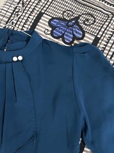 Elegant Teal Blue Pe9arl Embellished Blouse.