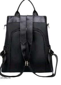 Stylish Black Backpack with Charm