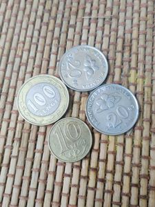 Collection of Assorted Coins from 4 countries .