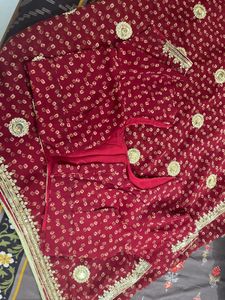 Elegant Maroon Saree with Gold Embroidery