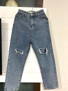 Distressed Blue Denim Jeans