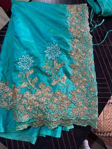 Beautiful Teal Embroidered saree with 34inch blous