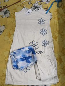 Chic White Kurta Set with Blue Floral Print