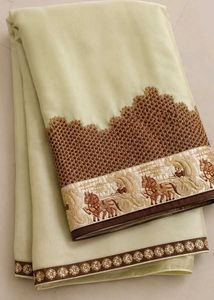 Elegant Cream Saree with Embroidered Border