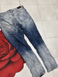 Distressed Blue Wash Jeans