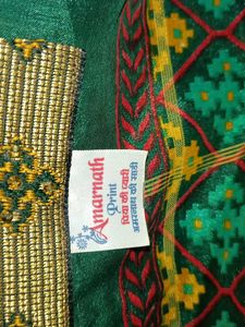 Elegant Green Saree with Intricate Weave