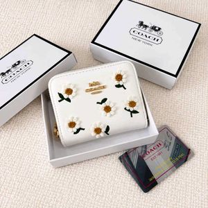Coach(COPY)mini embroidered daisy flowers