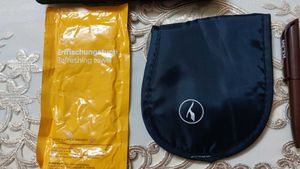 Tumi pouch andTravel Amenity Kit