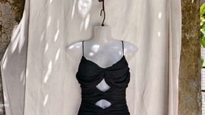 2254. Ruched Cutout Mini Dress It's mesh