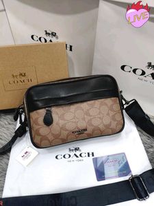 COACH* *GRAHAM CROSSBODY IN SIGNATURE CANVAS
