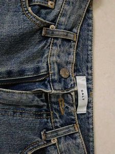 Distressed Blue Denim Jeans