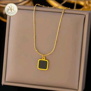 Elegant Gold Chain with Black Pendant