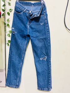 Distressed Blue Denim Jeans