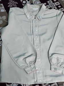 cream colored embroidery detail shirt