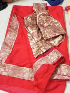 Vibrant Red Saree with Golden Blouse