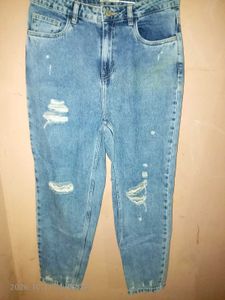 Distressed Blue Denim Jeans