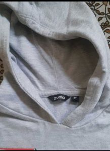 Grey Hooded Top with "M" Graphic